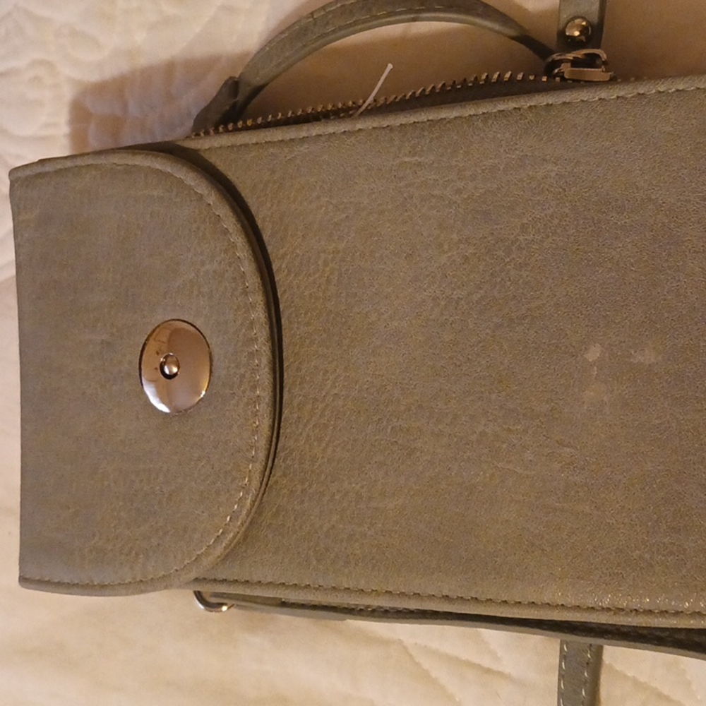 Small clutch with strap